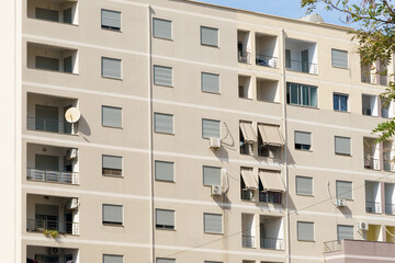 Fototapeta premium Contemporary Mediterranean residential apartment building in Albania designed for urban living. Ideal for rental listings, property purchase, relocation assistance, vacation stays