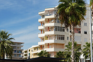 Modern residential apartment building in Mediterranean style located in Albanian city, with contemporary design. Suitable for rental, property purchase, relocation, vacation, and real estate agencies
