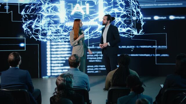 AI-driven business presentation showing machine learning and deep learning demos on digital screen. Businesspeople presenters discuss funding strategy with investors and audience. Camera A.