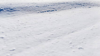 white fresh snow covered land ground from drone aerial photography background nobody