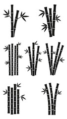 Set of Black Bamboo Stalks with Leaves, Isolated on White Background