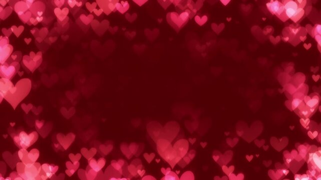 Glowing pink hearts creating border on red background for Valentine's day. Heart shapes floating to center frame for a romantic theme celebrating love, passion, or for Valentines day background.