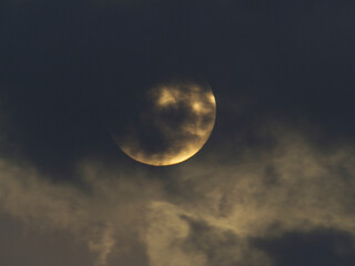 Tokyo,Japan - February 2,2026: The full moon covered with Moving clouds at dawn