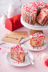 Pound cake baked in a Bundt pan with pink sprinkles for Valentines Day