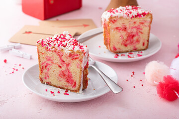 Pound cake baked in a Bundt pan with pink sprinkles for Valentines Day