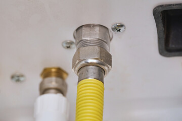 Close Up of Yellow Gas Hose Connection