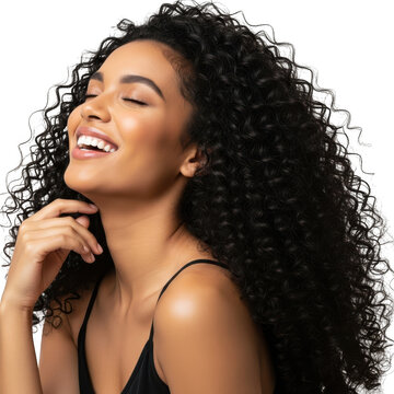 Beautiful young woman with curly hair smiling and touching her face isolated on transparent background