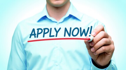 Professional man writes the urgent message APPLY NOW with a red marker on a transparent screen in a bright business sett