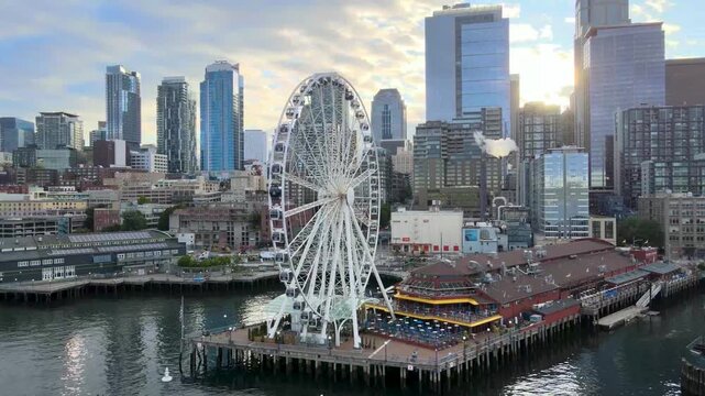 Seattle Waterfront Ferris Wheel aerial view with City in the background.