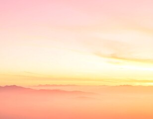 Fototapeta premium A serene, vertical image captures a tranquil dawn over distant mountain ranges shrouded in a delicate, soft mist with a gradient sky