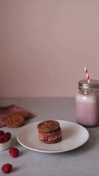 Homemade Pink Berry Ice Cream Sandwiches with Oatmeal Cookies