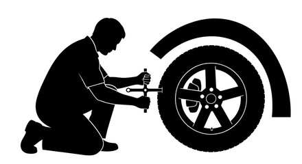 Mechanic repairing a car tire with a wrench in a service station setting