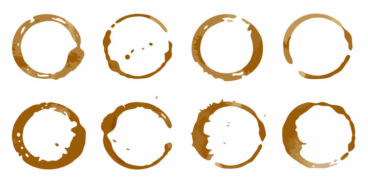 Coffee ring stains arranged in a grid pattern on a white background