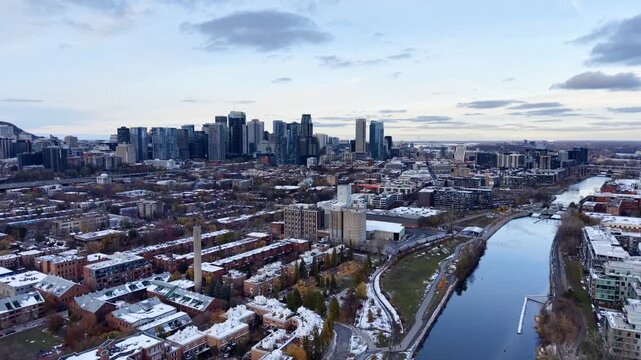 defaultAerial view of Griffintown Montreal and Lachine Canal with winter cityscape and river at daytime. g.