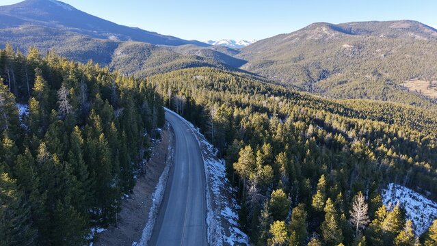 Aerial view of vegetative rockies mountains in Evergreen (colorado), on a sunny day in the winter