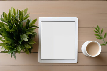 A simple, flat desk with an empty screen and related equipment.