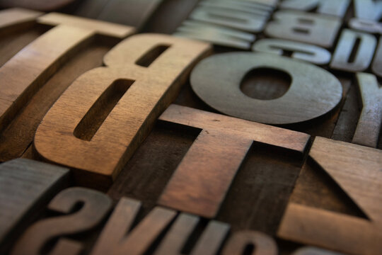 Wooden letterpress printing blocks in closeup