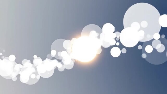 Abstract image of floating, white circles against a soft grey and blue gradient background