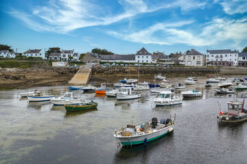 Carnac in Brittany, near the gulf of Morbihan, traditional harbor and beach, stormy weather
