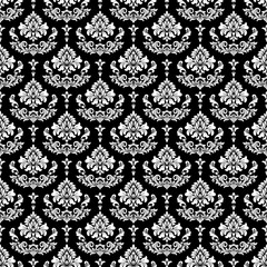 Classic black and white seamless damask pattern with elegant floral ornaments. Luxury vintage background ideal for wallpaper, textile, fabric, wrapping paper, packaging, and interior decoration.
