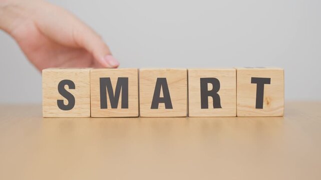 hand change wooden block Start to Smart. Intelligent, Clever, Beginning, Startup, Growth and New life chapter concepts
