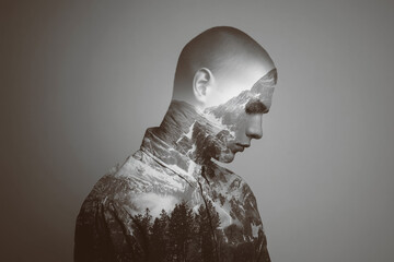 silhouette of man with mountains