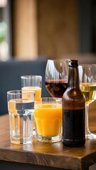 Assortment of refreshing drinks like water, juice, wine, and beer on a