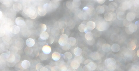 Fantasy holiday golden glow effect with glittering particles and soft shining festive light.