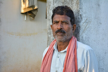 Fototapeta premium Portrait of indian farmer in rural village