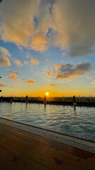 Fototapeta premium Sunset Over Waterfront Pier