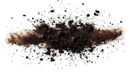 An isolated pile of dry earth and scattered particles against a stark black backdrop
