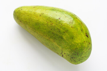 Single fresh avocado displayed on white, highlighting natural shape and textured skin.