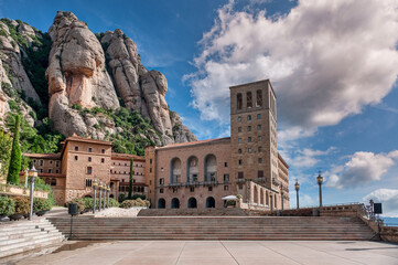 Obraz premium The monastery of Santa Maria de Montserrat is a Benedictine abbey located on the Montserrat mountain, belonging to the Bages region, province of Barcelona, ​​Spain.