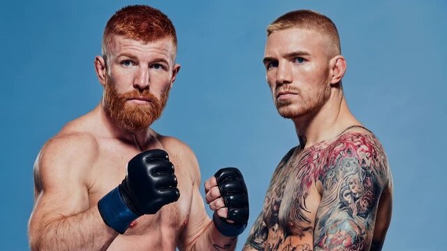 Two professional boxers posing in fighting stance before bout demonstrating strength readiness rivalry and intense competitive sports spirit