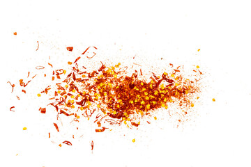Spicy chili red pepper flakes, chopped, milled dry paprika pile isolated on white, top view