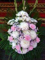 Traditional Thai Funeral Wreath with White Flowers and Ribbon