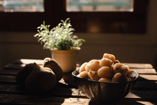 Rustic table with ingredients such as dried potato known as Chu&ntilde;o.
