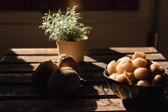 Peruvian Andean potatoes in a bowl on a wooden table