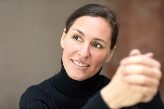 Smiling woman looking sideways