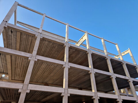 precast concrete skeletal frame. This is a modular construction method Precast Column vertical members. Notice small notches or corbels protrusion that act as seats for the horizontal beams.