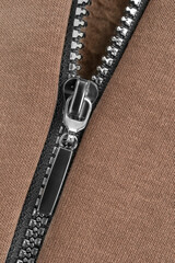 Jacket zipper closeup © Tarzhanova