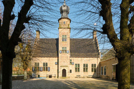 View of the Poptaslot in Marsum Friesland The Netherlands in spring. Poptaslot also called Azingastate or Heringastate is a stins and built in the 15th century.	