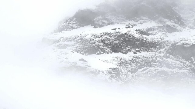 Mists envelop the mountains of Gran Paradiso national park, Italy landscape