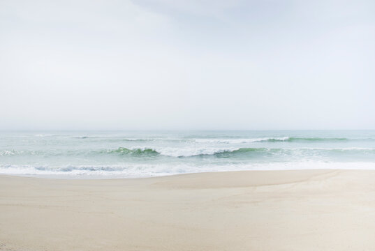 USA, Massachusetts, Nantucket, Calm ocean waves washing empty Madaket Beach