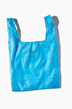 Blue reusable totebag on white background