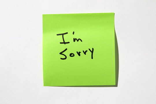 I'm Sorry on green post it note
