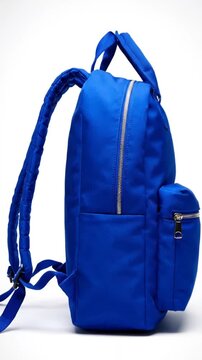 Bright blue minimalist backpack with top handles on white background