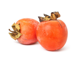 Two Fresh Persimmons with Stems Isolated on White Background