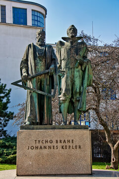 Two bronze statues depict the famous astronomers Tycho Brahe and Johannes Kepler, standing side by side in Prague, Czech Republic