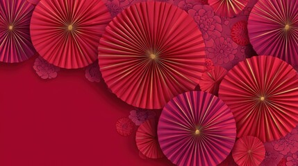 Obraz premium Vibrant red and pink paper fan decorations with floral accents.